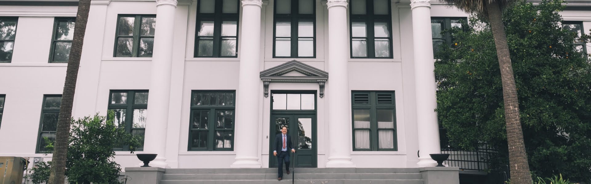 Kirk on the steps of the clerk's office